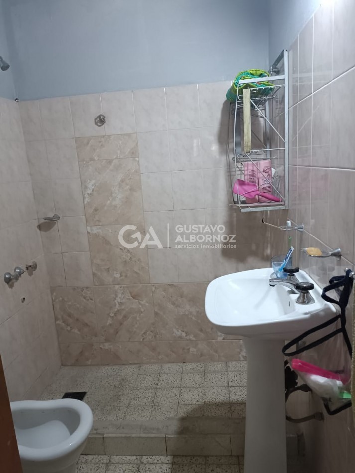 Local con departamento en venta