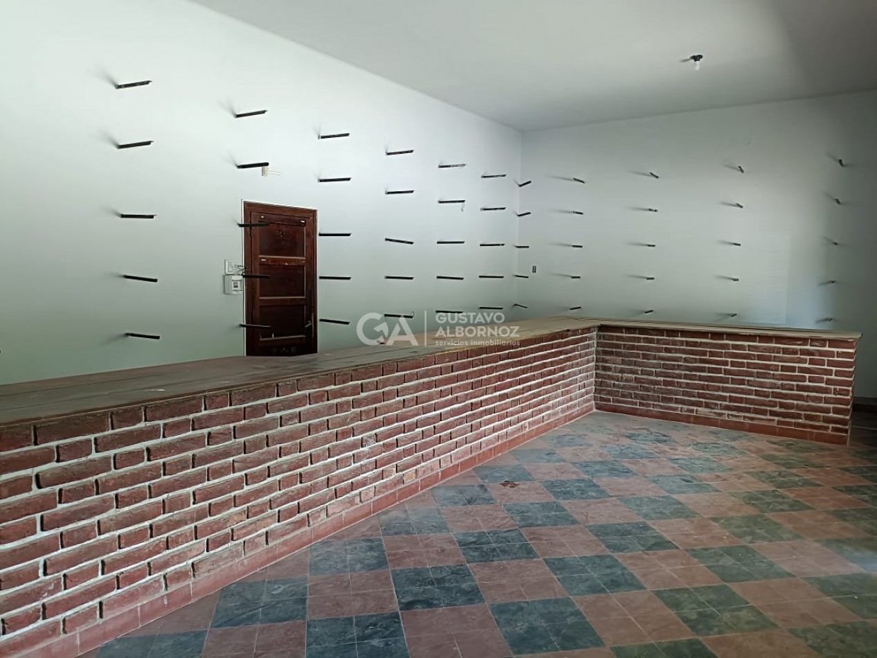 Local con departamento en venta